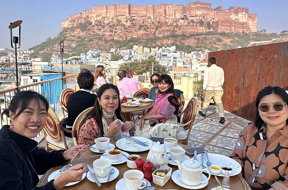 Traditional Indian foods including Dal Baati Churma, Butter Chicken, Petha, and Chaat enjoyed during a Golden Triangle Tour in India.
